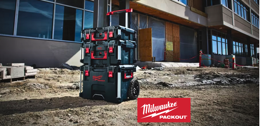 Milwaukee PACKOUT modular tool storage system with rolling base and heavy-duty latches.